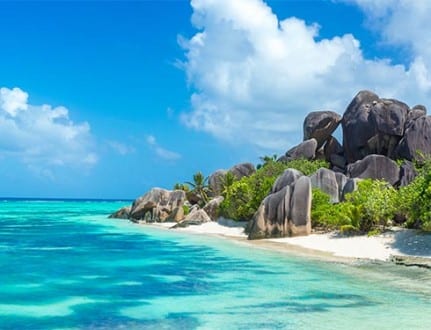 Exotic destination in Seychelles - Anse Source d'Argent - beautiful beach on tropical island La Digue